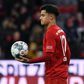 Philippe Coutinho walks off with the match ball after his hat-trick against Werder Bremen