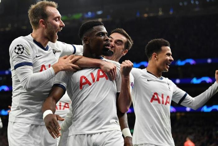 Comeback kings: Tottenham players celebrate Serge Aurier's (second left) strike against Olympiakos