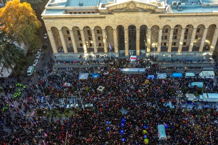 Tens of thousands of protesters gathered outside parliament on Monday