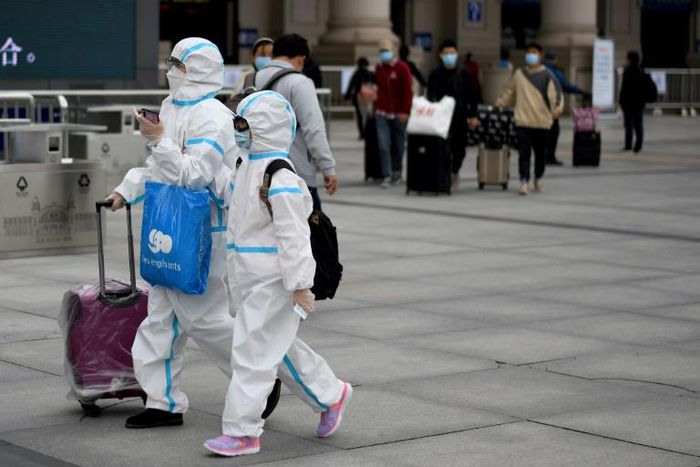 Authorities in Wuhan abruptly raised the city's death toll by 50 percent on Friday