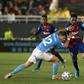 Close contact: Barcelona defender Junior Firpo (right) tussles with Ibiza defender Kike Lopez