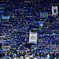 Atalanta fans cheer during the UEFA Champions League football match between Atalanta Bergamo and Valencia on February 19, 2020 at the San Siro stadium in Milan