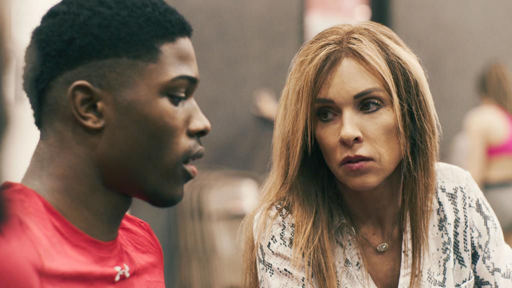 Coach Monica with cheerleader LaDarius Marshall