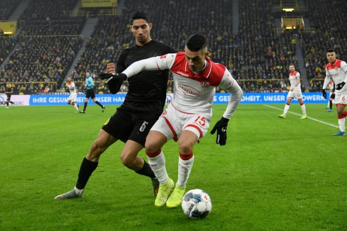 Fortuna Duesseldorf midfielder Erik Thommy (R) sealed his team's 2-1 win at home to Union Berlin on Sunday with a superb strike in the 90th minute.