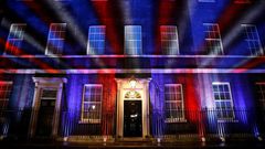Red, white and blue lights illuminate 10 Downing Street, the official residence of Britain's Prime Minister, in central London after Britain left the European Union