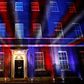 Red, white and blue lights illuminate 10 Downing Street, the official residence of Britain's Prime Minister, in central London after Britain left the European Union