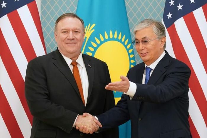 US Secretary of State Mike Pompeo shakes hands with Kazakh President Kassym-Jomart Tokayev