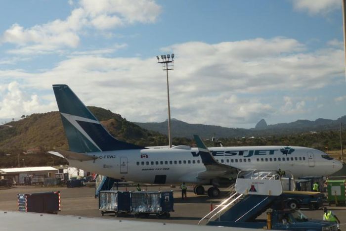 A Canadian Westjet airline jet parked at Hewanorra International Airport, St Lucia, on February 3, 2019.