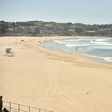 The usually teeming Bondi beach in Sydney was largely deserted after authorities urged Australians top stay at home