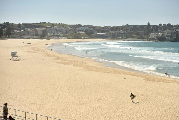 The usually teeming Bondi beach in Sydney was largely deserted after authorities urged Australians top stay at home