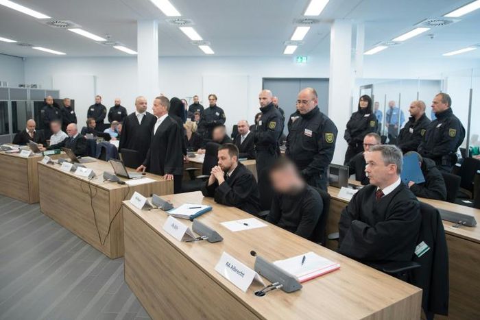The defendants of the so-called "Revolution Chemnitz" group sit in the courtroom in Dresden, eastern Germany, on September 30, 2019, the first day of the trial of the neo-Nazi "terrorist" cell accused of plotting violent political upheaval in Germany