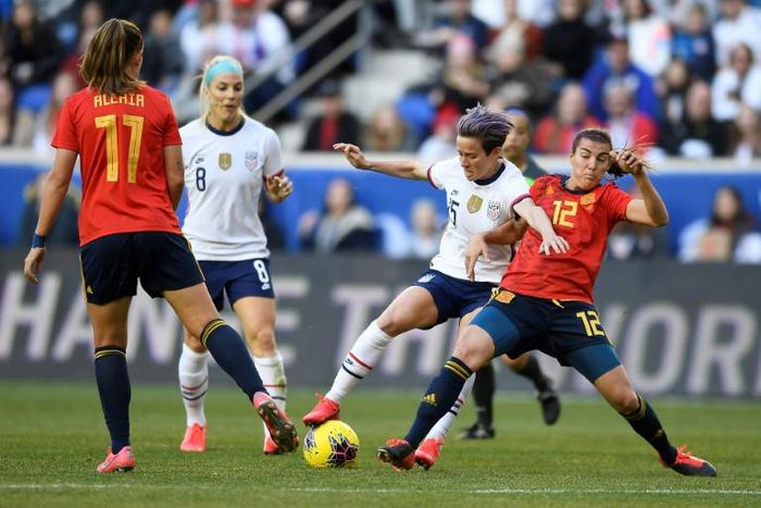 American Megan Rapinoe battles Patricia Guijarro of Spain for the ball in a US victory in the 2020 SheBelieves Cup