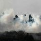 Young Palestinians brave Israeli tear gas to demonstrate against a rumoured land seizure near the northern West Bank city of Nablus