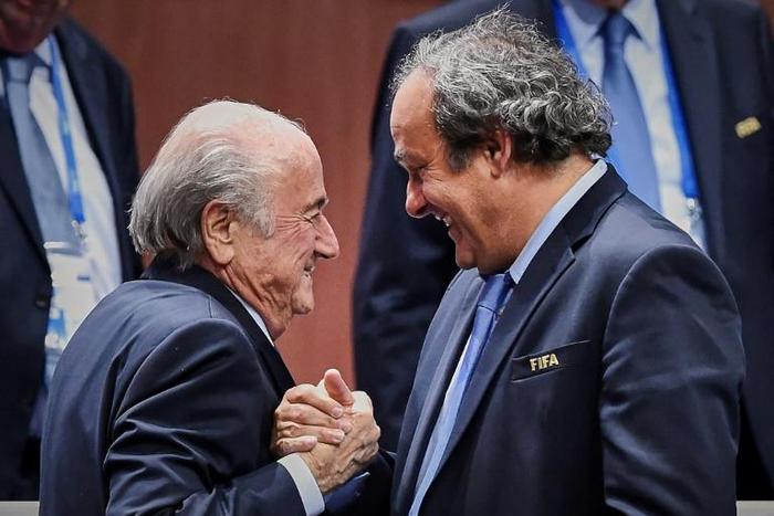 FIFA President Sepp Blatter accepted the congratulations of Michel Platini after being re-elected as FIFA president in 2015. Both men are now banned