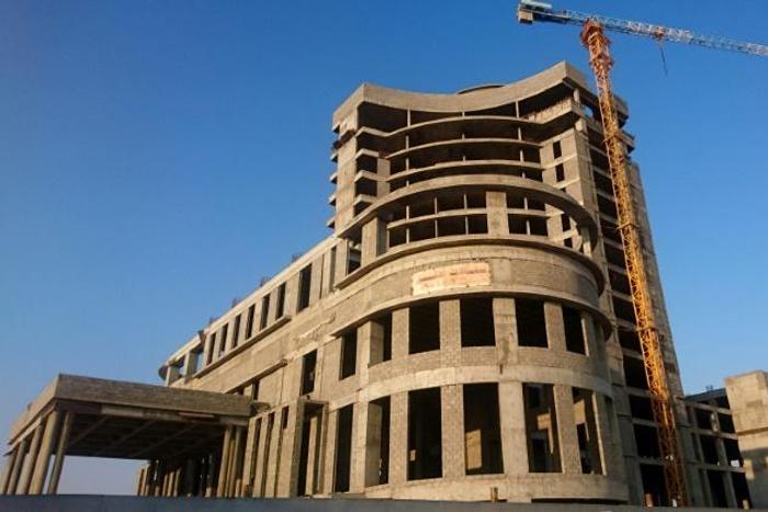 The shells of several Qatari-funded luxury hotels lie abandoned in the Saudi city of Al-Ahsa