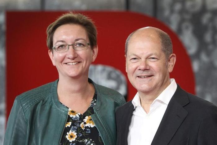 Klara Geywitz (L) and Olaf Scholz are tipped to lead Germany's Social Democratic Party SPD, in which case it would likely remain a coalition partner with Angela Merkel's CDU