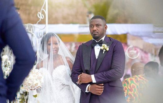 John Dumelo and wife