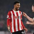 Sheffield United's French striker Lys Mousset (left) celebrates scoring against Manchester United