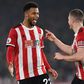 Sheffield United's French striker Lys Mousset (left) celebrates scoring against Manchester United