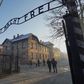 A file picture taken on December 5, 2019 shows the main gate at the entrance to the Nazi Auschwitz concentration and extermination camp in  Poland