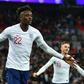 England striker Tammy Abraham celebrates after scoring their seventh goal against Montenegro