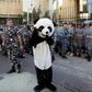 Lebanese protesters - including one dressed in a panda suit - tried to prevent judges and lawyers from going to work