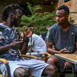 Real Kashmir players Armand Bazie (left) and Gnohere Krizo of Ivory Coast talk in their Srinagar hotel restaurant during the coronavirus lockdown