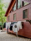 Gis and other laundry dries outside a cabin at Camp Laurel.