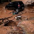 View of a car on January 29, 2020 that was dragged by heavy rains in Belo Horizonte, Brazil