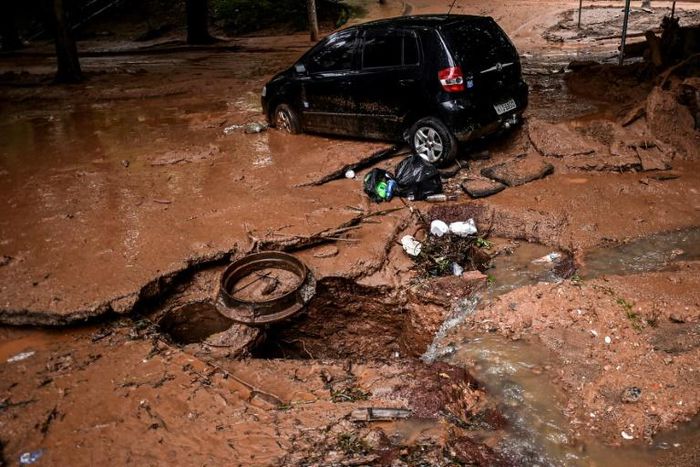View of a car on January 29, 2020 that was dragged by heavy rains in Belo Horizonte, Brazil