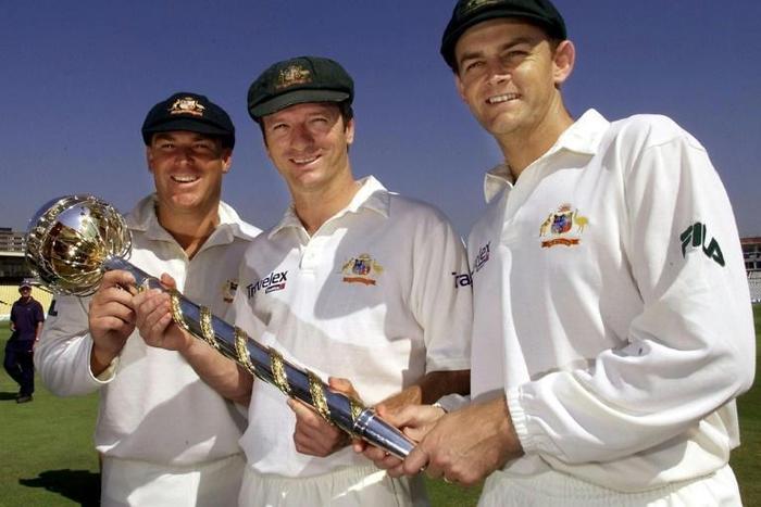 Shane Warne, on the left, wearing his 'baggy green' in 2001