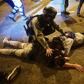 Police detain protesters and students after they attempted to escape from Hong Kong Polytechnic University campus and from police in the Hung Hom district of Hong Kong on November 19