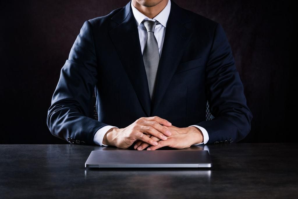 Businessman in front of laptop