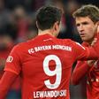 Bayern Munich's German forward Thomas Mueller (R) enjoys a key partnership with Poland striker Robert Lewandowski