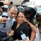 Keiko Fujimori arrives at a Lima courthouse with her husband Mark Villanella on Tuesday