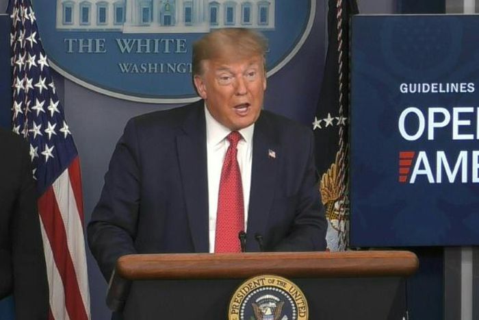 President Donald Trump says the reopening of the US economy will take place gradually, with states that saw little of the pandemic starting first