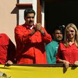 Venezuela President Nicolas Maduro (center) goads opposition leader Juan Guaido at an 'anti-imperialsim' rally in the capital Caracas