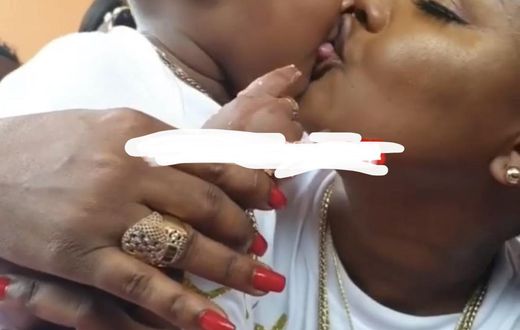 Nana Ama McBrown kisses Baby Maxin