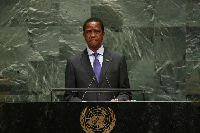 Zambia president Edgar Chagwa Lungu (pictured September 2019) is allegedly "central" to an "illicit network" of timber trafficking