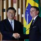 Chinese President Xi Jinping (L) and Brazilian President Jair Bolsonaro after their bilateral meeting in Brasilia on the eve of a BRICS summit