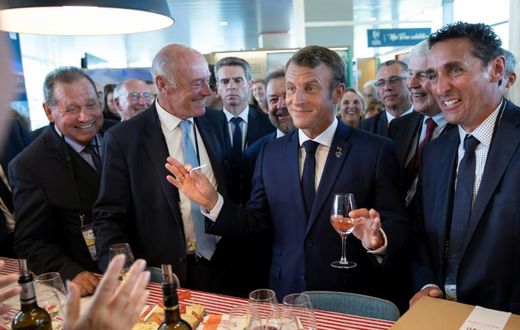 French President Emmanuel Macron sampling local wines in Agnlet, in the heart of Bordeaux, in August. He reportedly told winegrowers there would be no Dry January campaign