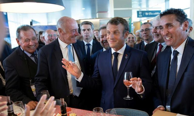 French President Emmanuel Macron sampling local wines in Agnlet, in the heart of Bordeaux, in August. He reportedly told winegrowers there would be no Dry January campaign