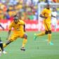 A file photo of Mpho Makola (L) playing for former club Orlando Pirates. He has been banned for six months after shoving a referee