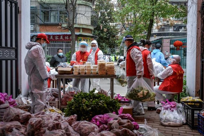 China believes it has 'basically curbed' the spread of a disease that is believed to have emerged in a live animal market in the city of Wuhan in December