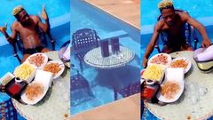 Shatta Wale's lunch in his swimming pool