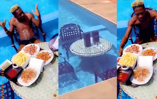 Shatta Wale's lunch in his swimming pool