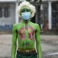 Masked: Performance artist Alex Kalemera tries to raise public awareness about the threat of coronavirus
