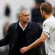 Tottenham manager Jose Mourinho talks to forward Harry Kane after their 3-2 win at West Ham