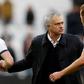 Tottenham manager Jose Mourinho talks to forward Harry Kane after their 3-2 win at West Ham