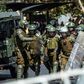 Chilean riot police take position during a protest against President Sebastian Pinera on the second anniversary of his inuguration in Santiago on March 11, 2020.